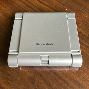 Brookstone travel clock and calculator